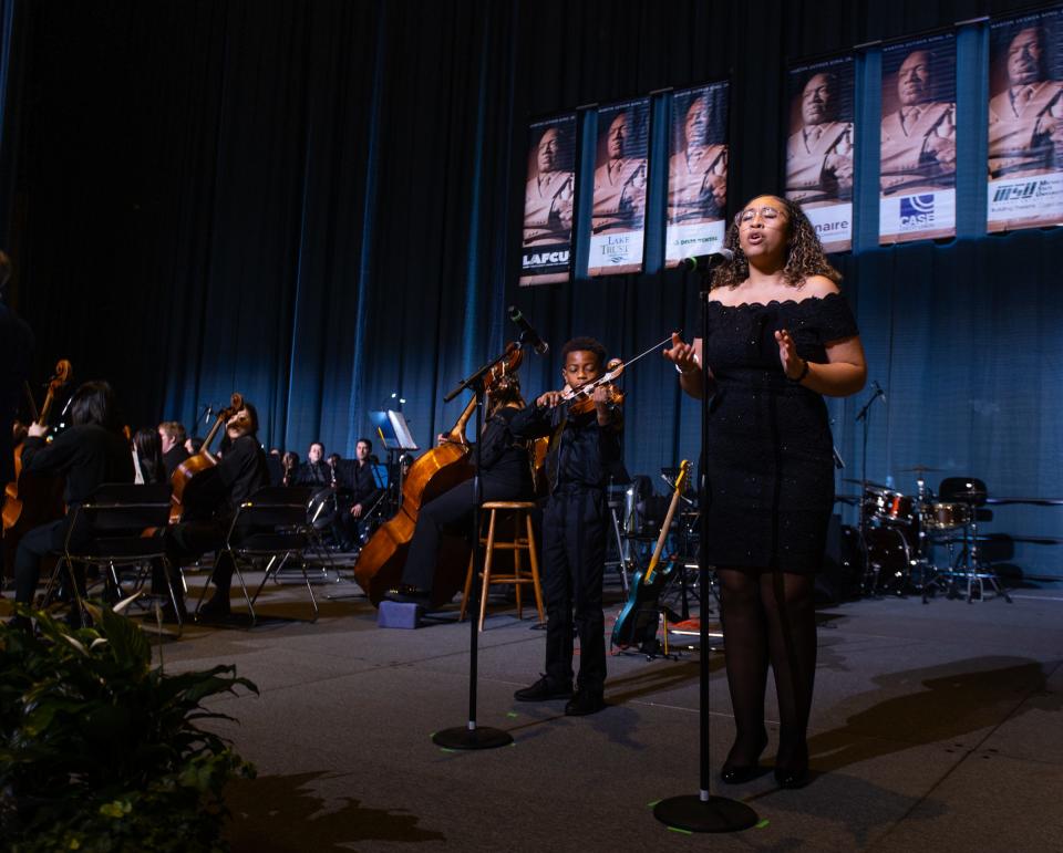 Kennedy Robertson, right, and Bryson Page perform the national anthem Monday, Jan. 15, 2024, during the 39th annual Martin Luther King Jr. Day of Celebration at the Lansing Center in downtown.