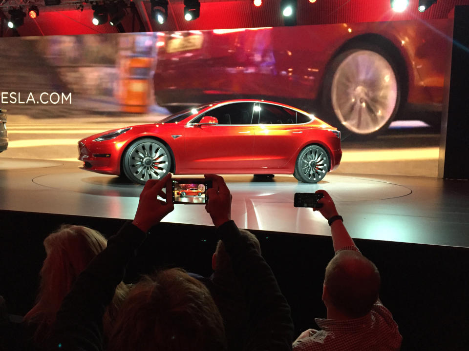 The Tesla Model 3 prototype. Pretty, yes. But profitable? 