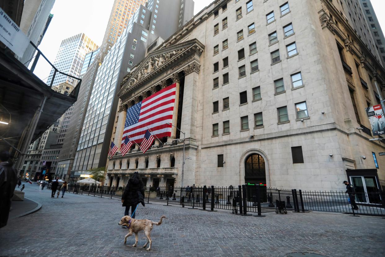 NEW YORK, Nov. 4, 2020 -- Pedestrians walk past the New York Stock Exchange in New York, the United States, Nov. 4, 2020.   Wall Street's major averages climbed on Wednesday as investors await the outcome of the U.S. election. The Dow Jones Industrial Average rose 367.63 points, or 1.34 percent, to finish at 27,847.66. The S&P 500 was up 74.28 points, or 2.20 percent, to 3,443.44. The Nasdaq Composite Index increased 430.21 points, or 3.85 percent, to 11,590.78. (Photo by Wang Ying/Xinhua via Getty) (Xinhua/Wang Ying via Getty Images)