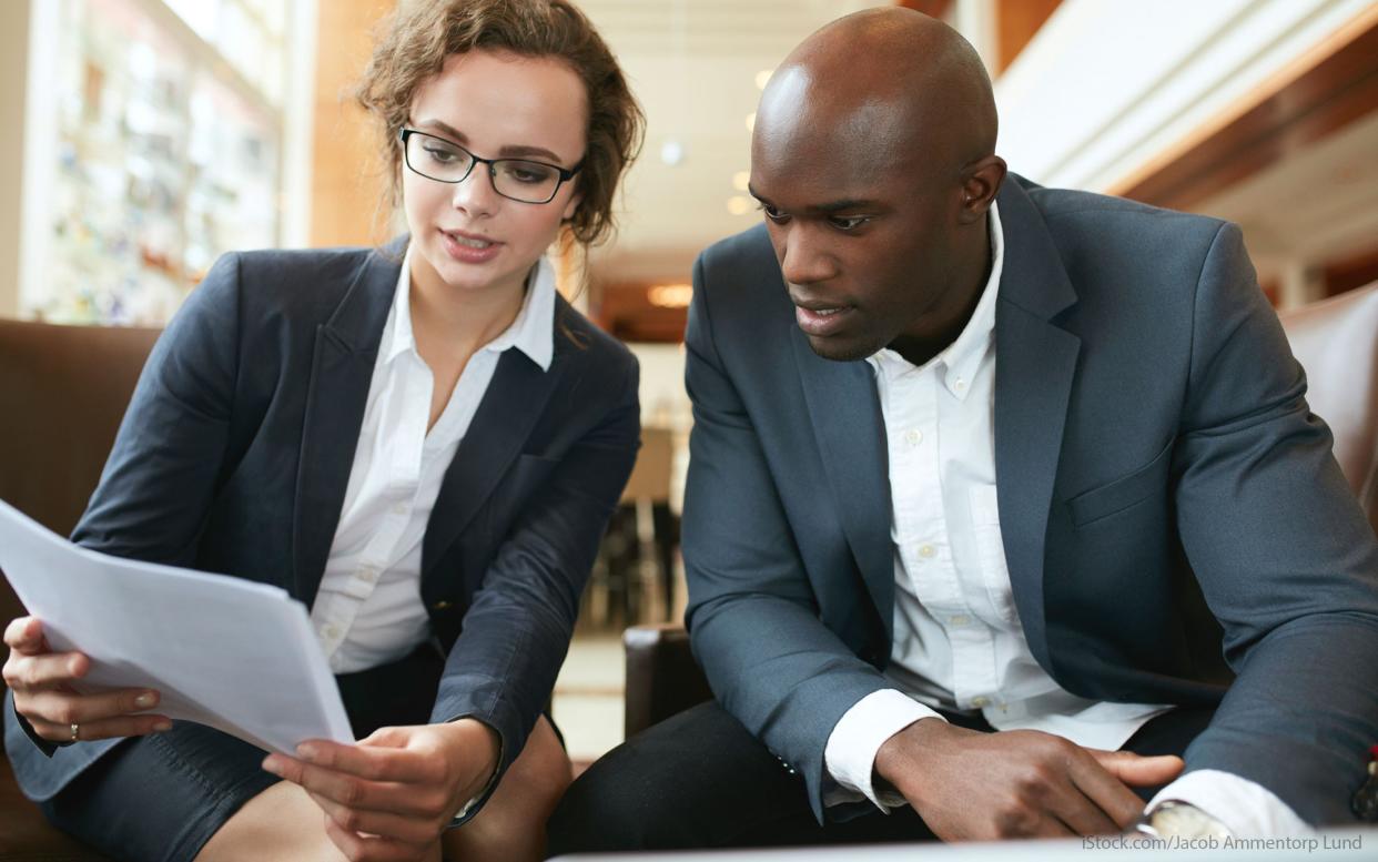 man and woman discussing 401k options