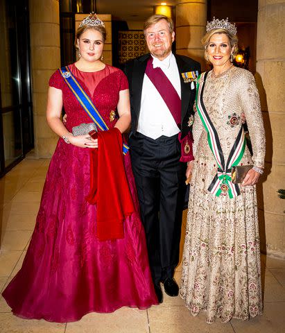 <p>Patrick van Katwijk/Getty</p> From left: Princess Catharina-Amalia, King Willem-Alexandra and Queen Maxima of the Netherlands attend the royal wedding in Jordan on June 1, 2023