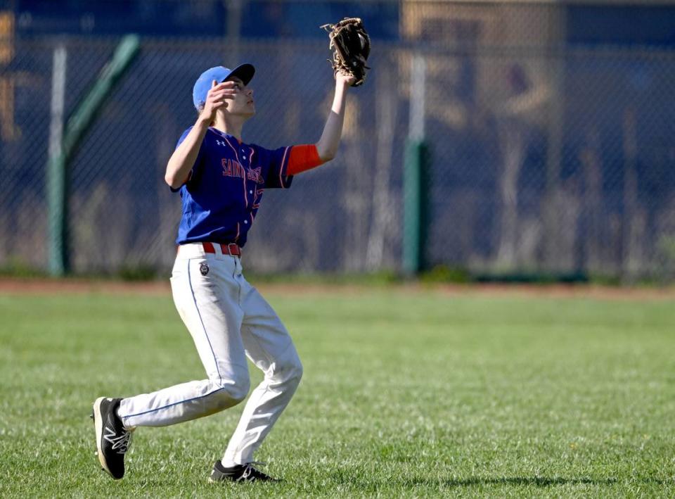 Saint Joseph’s Catholic Academy’s Rocco Gigante catches a pop fly during the game against Susquenita on Wednesday, April 19, 2023.