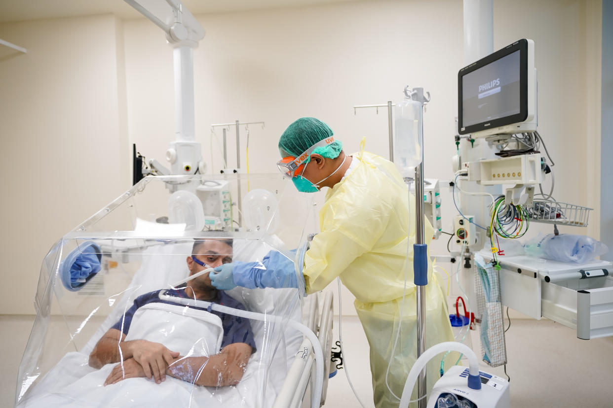 The detachable bio-aerosol containment units comes in three models and can be fixed onto hospital beds. (PHOTO: Ng Teng Fong General Hospital)