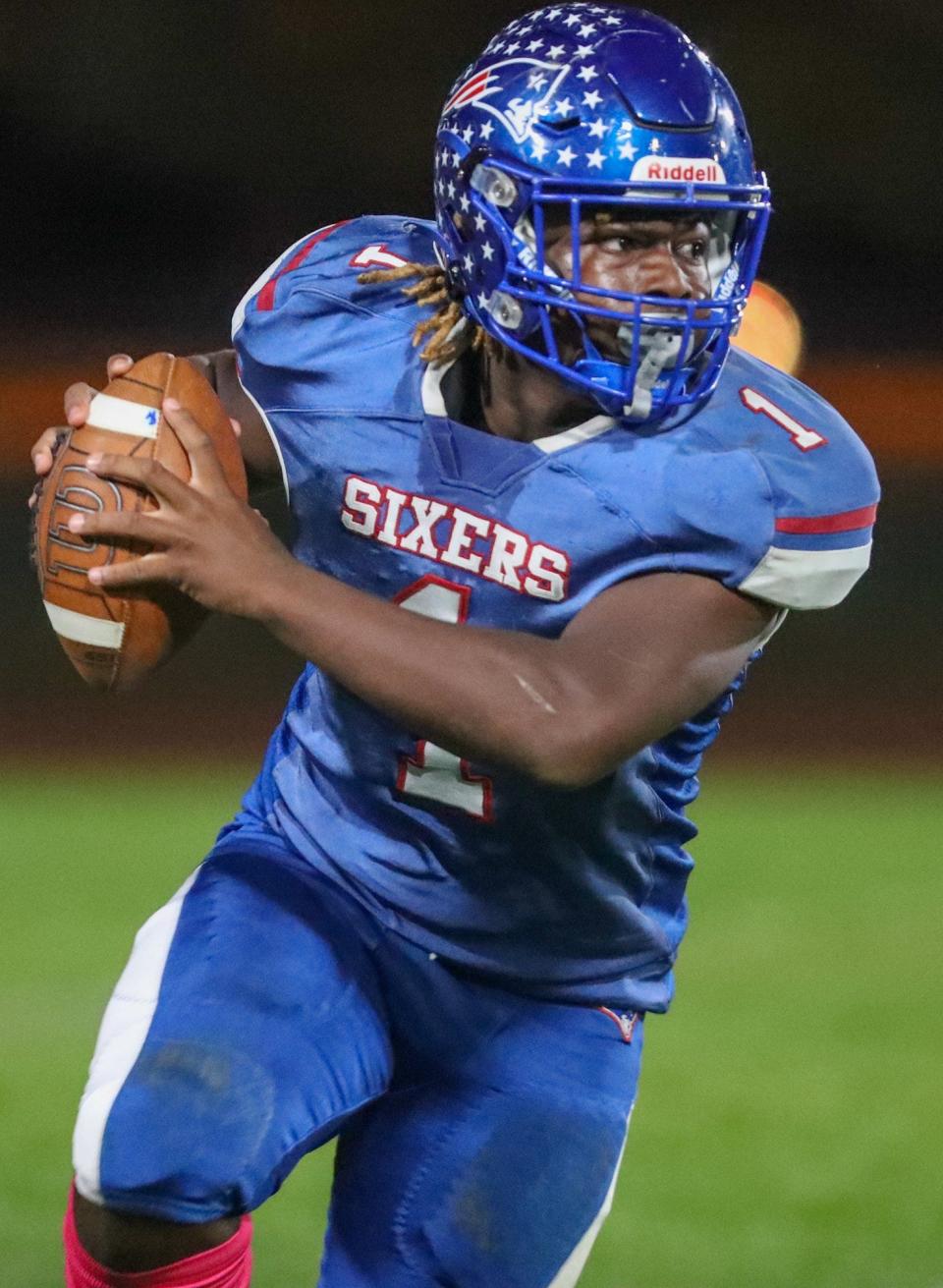 Independence's Antonio Harris scrambles for extra yards on Oct. 4.