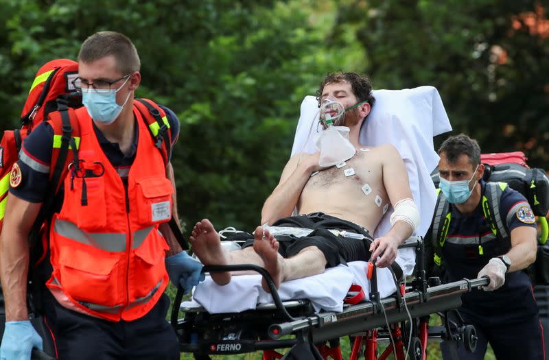 An asylum seeker is transported to a hospital after going on a hunger strike for more than a month in Brussels