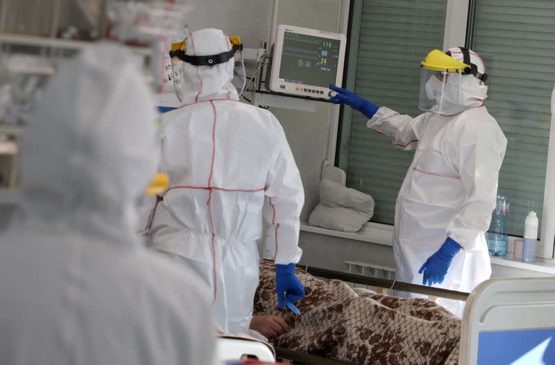 FILE PHOTO: Medicaal workers treat a patient suffering from the coronavirus disease (COVID-19) at Saint Anna hospital in Sofia