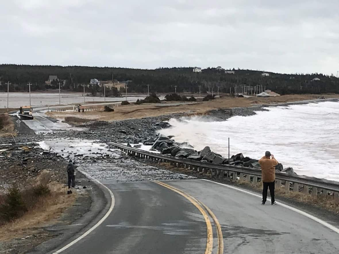 The road to Lawrencetown Beach was affected by a storm surge in 2018. (Steve Berry/CBC - image credit)