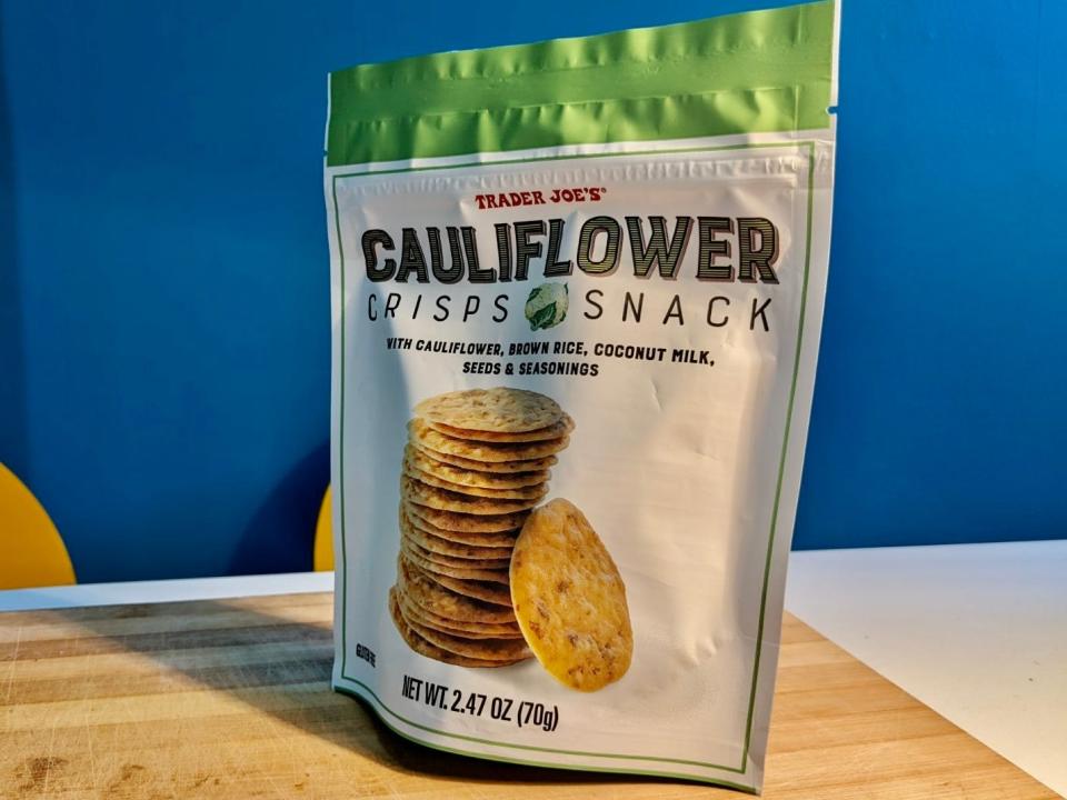 package of trader joe's cauliflower crisps on a kitchen table