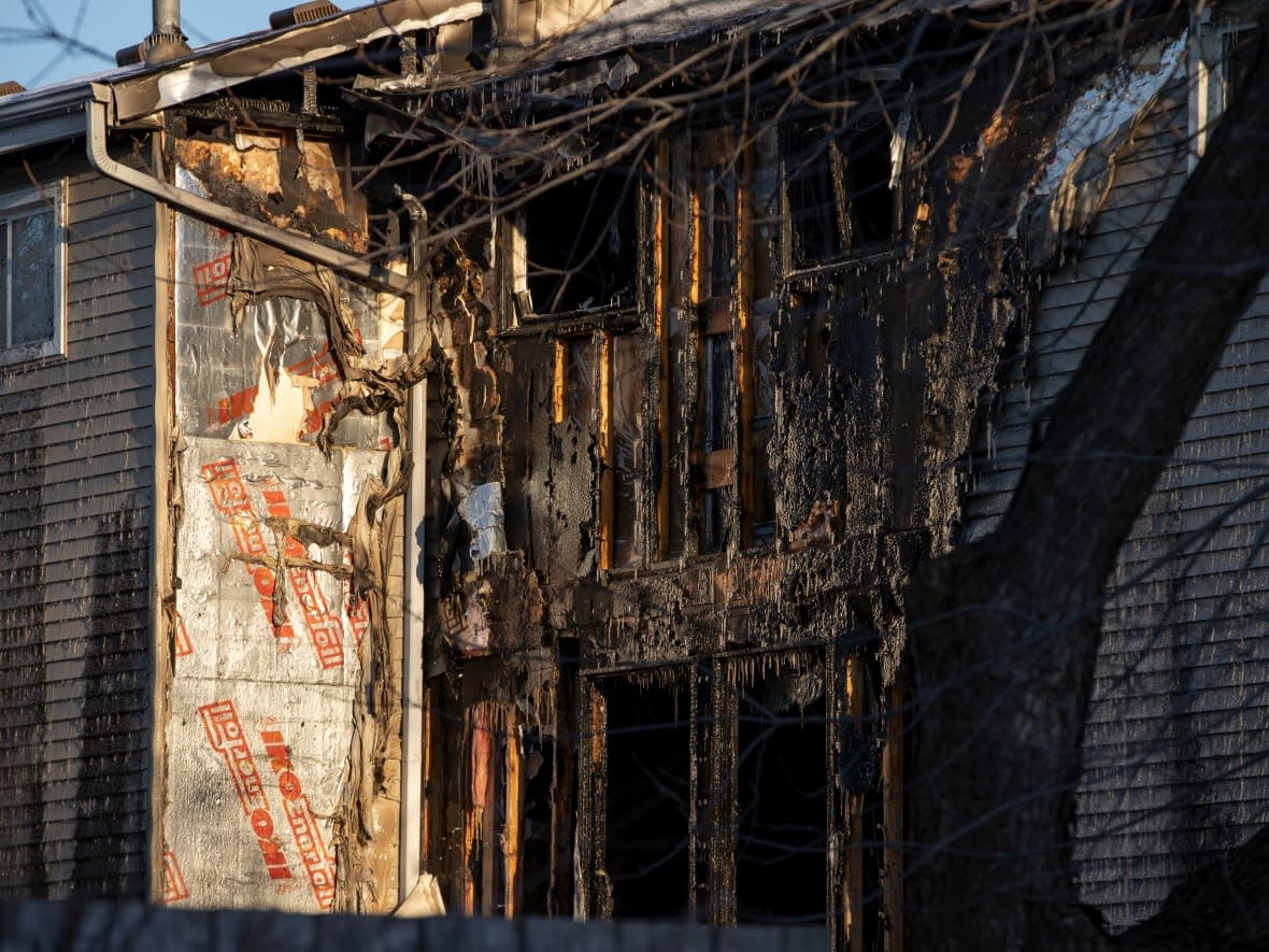 Three children were rushed to hospital and later pronounced dead after being pulled from a townhouse fire in Brampton, Ont., on Thursday. (Evan Mitsui/CBC - image credit)