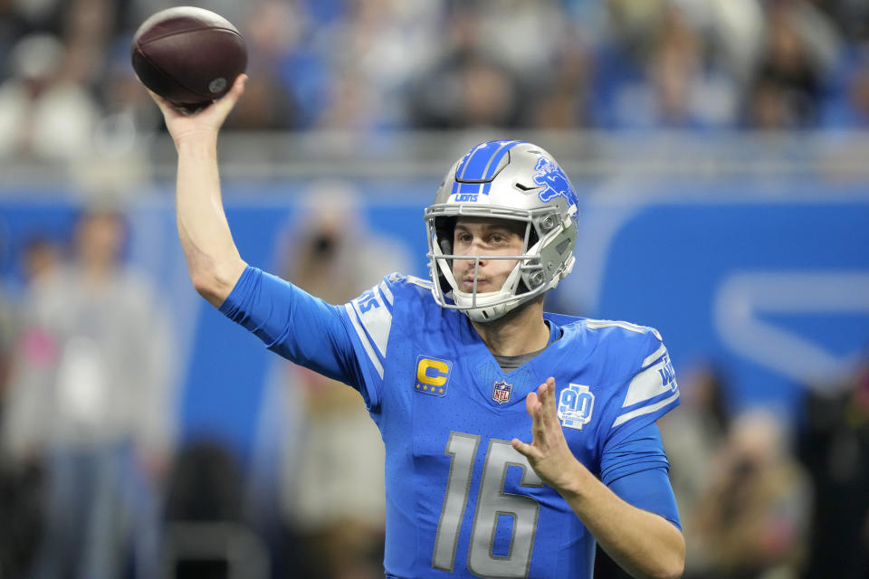 Detroit Lions quarterback Jared Goff passes against the Tampa Bay Buccaneers during the first half of an NFL football NFC divisional playoff game, Sunday, Jan. 21, 2024, in Detroit. (AP Photo/Carlos Osorio)