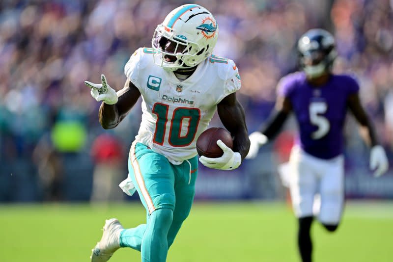 Miami Dolphins wide receiver Tyreek Hill (L) is under investigation by the NFL after being accused of assault in June. File Photo by David Tulis/UPI