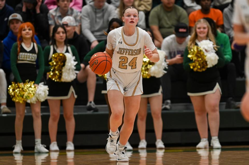 Jefferson’s guard Brinley Altenburg (24) runs with the ball on Friday, March 1, 2024 at Jefferson High School in Sioux Falls.