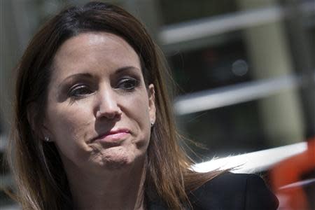 Diana Durand, ex-girlfriend and former fundraiser for Republican U.S. Representative Michael Grimm exits the Brooklyn Federal Courthouse in the Brooklyn Borough of New York May 5, 2014. REUTERS/Brendan McDermid