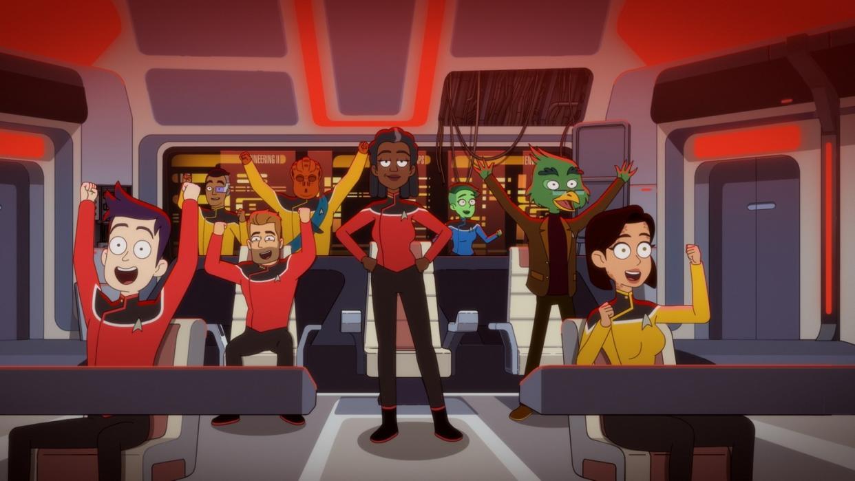  Still from the animated T.V. show Star Trek: Lower Decks. Here we see the whole crew sitting on the deck, celebrating. 