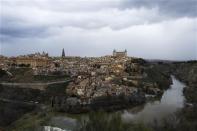 A general view of the medieval city of Toledo and the Tajo river January 22, 2014. REUTERS/Paul Hanna