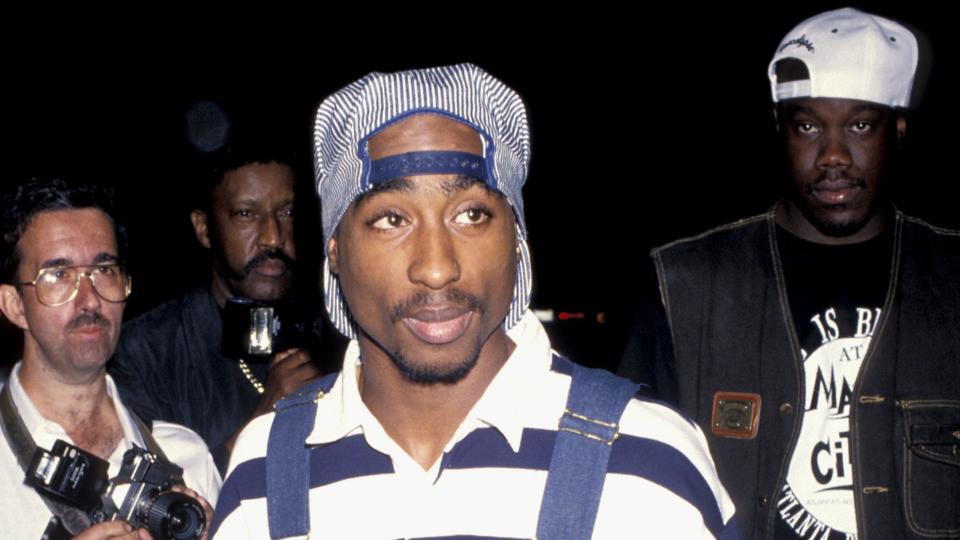 tupac in overalls and polo shirt at 1st annual minority motion picture awards