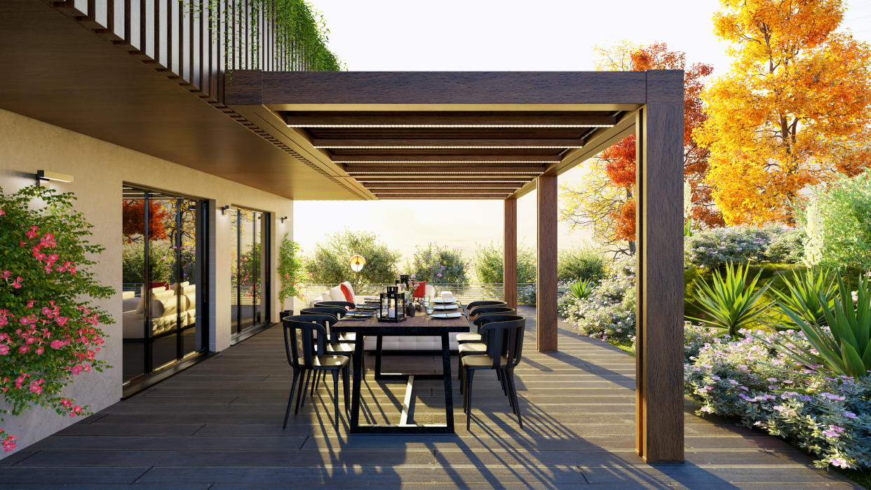  A outdoor deck with garden furniture in fall. 