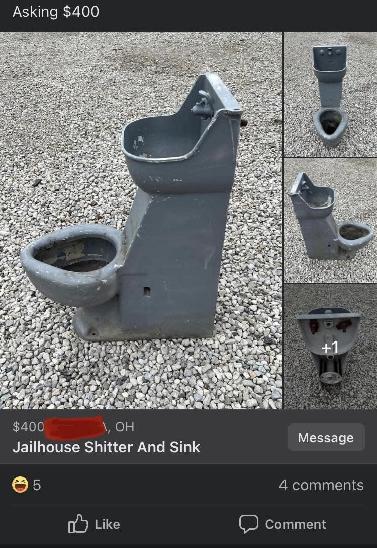 A combination toilet and sink fixture, labeled "Jailhouse shitter and sink," displayed on a gravel surface