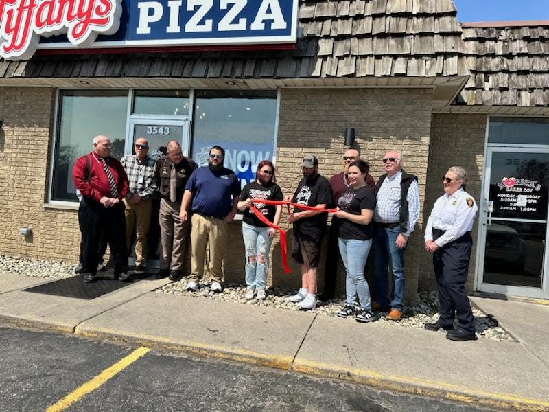 A grand opening was held April 9 at Tiffany’s Pizza, 3543 N. Dixie Highway, the former location of Mary Sacco's Pizza.