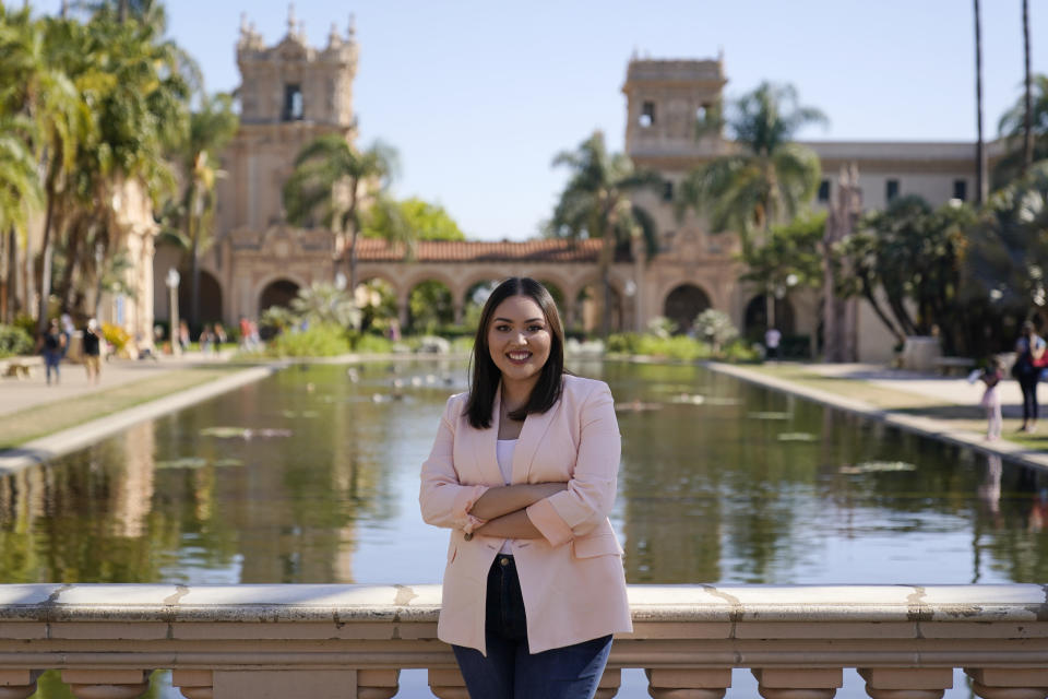 Natalie Naranjo-Morett stands for a portrait Monday, April 19, 2021, in San Diego. "I've started to look for jobs," said Natalie Naranjo-Morett, who will graduate in June with a history degree from the University of California San Diego. "I want to go into museum work, but that's become very difficult because of the pandemic." (AP Photo/Gregory Bull)