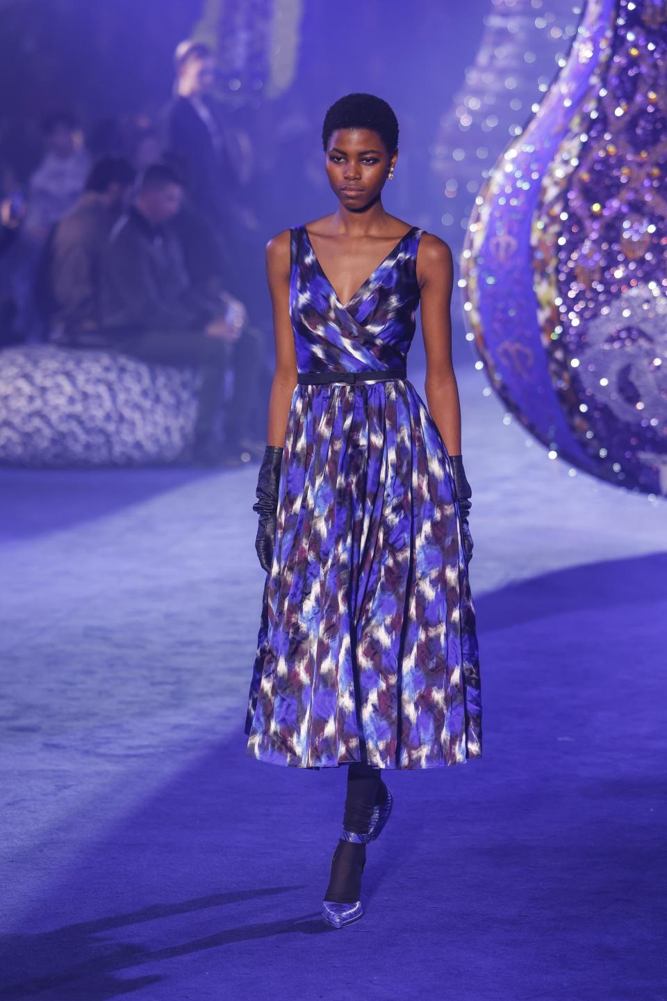A model wears a creation as part of the Christian Dior Fall/Winter 2023-2024 ready-to-wear collection presented Tuesday, Feb. 28, 2023 in Paris. (Vianney Le Caer/Invision/AP)