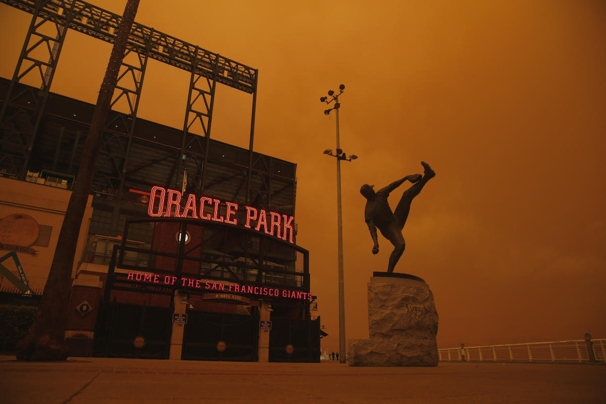 Giants, Athletics play under ominous orange sky amid California wildfires