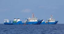 Chinese vessels are pictured at the disputed Scarborough Shoal April 6, 2017. REUTERS/Erik De Castro