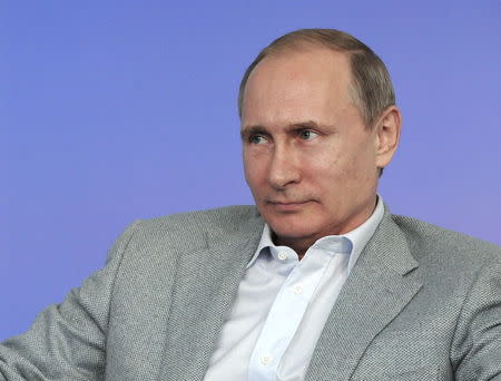Russian President Vladimir Putin attends an educational youth forum in Vladimir region, Russia July 14, 2015. REUTERS/Mikhail Klimentyev/RIA Novosti/Kremlin