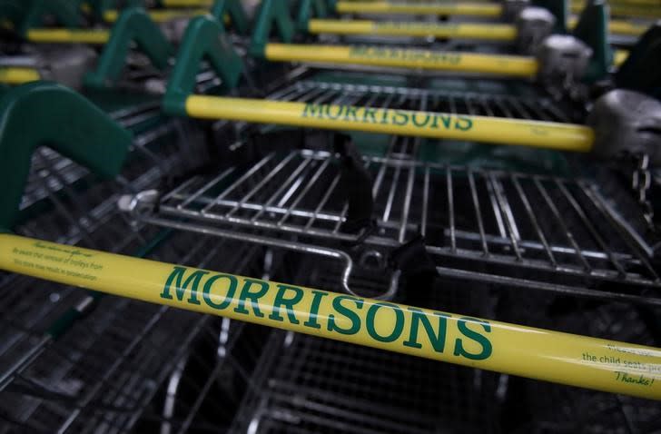 FILE PHOTO: Shopping trolleys are seen outside of a branch of the food retailer Morrisons in west London, Britain, January 7, 2017. REUTERS/Toby Melville/File Photo