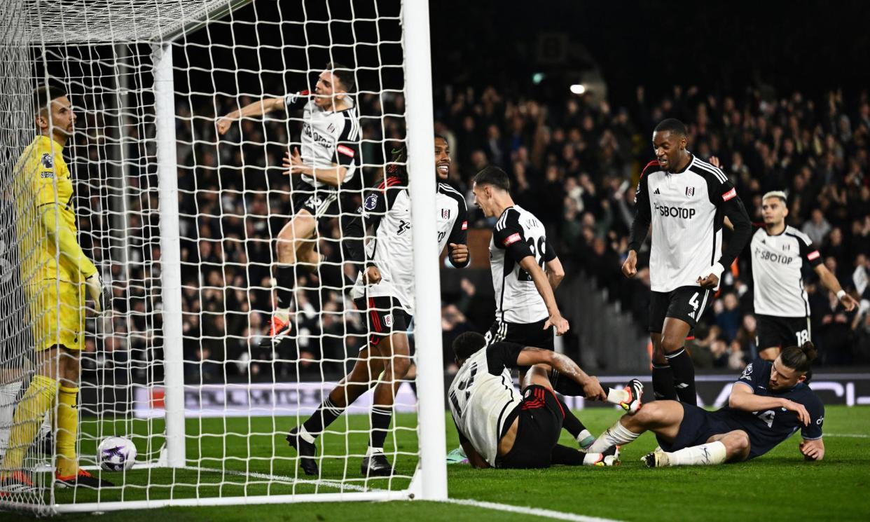 <span>Rodrigo Muniz celebrates scoring his second goal with teammates in Fulham’s win against Tottenham.</span><span>Photograph: Dylan Martinez/Reuters</span>
