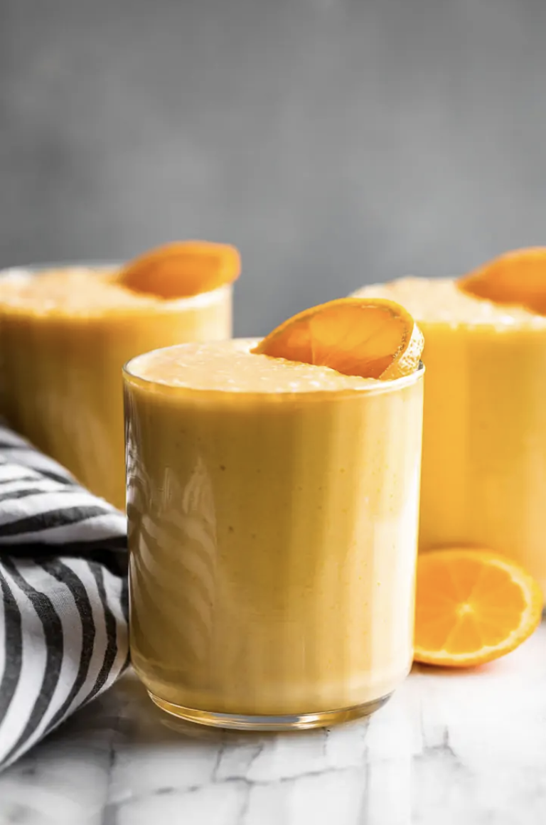 <p>This orange creamsicle smoothie tastes just like sherbet. All you need is oranges, orange zest, vanilla, and coconut milk to whip it up in your blender. </p><p><em>Per serving: 334 cals, 20.4 g fat, 38.9 g carbs, 24.2 g sugar, 6.5 g fiber, 4.5 g protein</em></p><p><a class="link " href="https://getinspiredeveryday.com/food/orange-creamsicle-smoothie/" rel="nofollow noopener" target="_blank" data-ylk="slk:Get the recipe;elm:context_link;itc:0">Get the recipe</a></p>