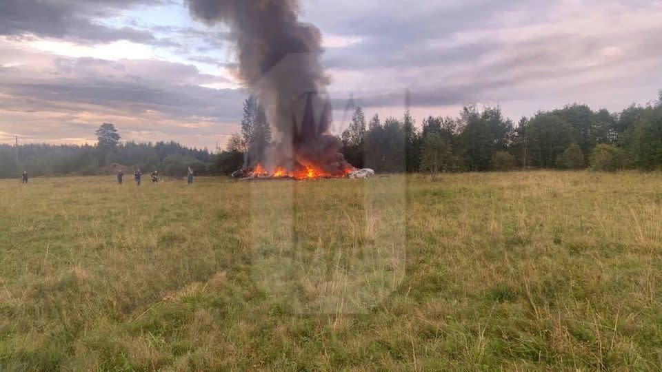 Plane wreckage is seen in Russia's western Tver region on August 23, 2023. - Ostorozhno Novosti via Reuters
