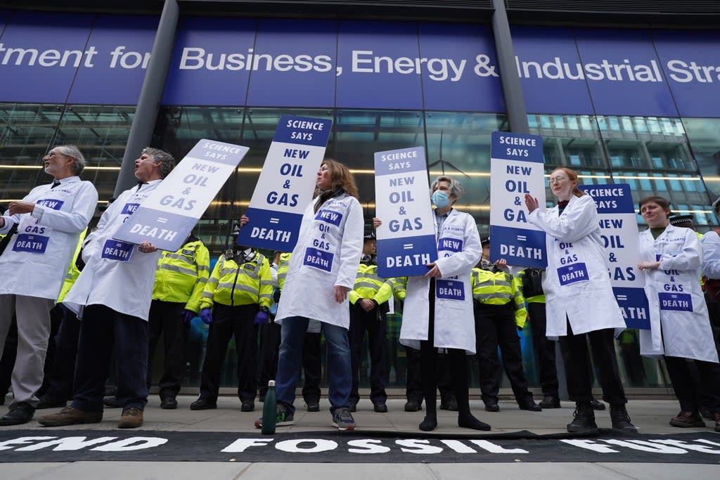 Demonstrators outside the Department for Business in London (PA Wire)