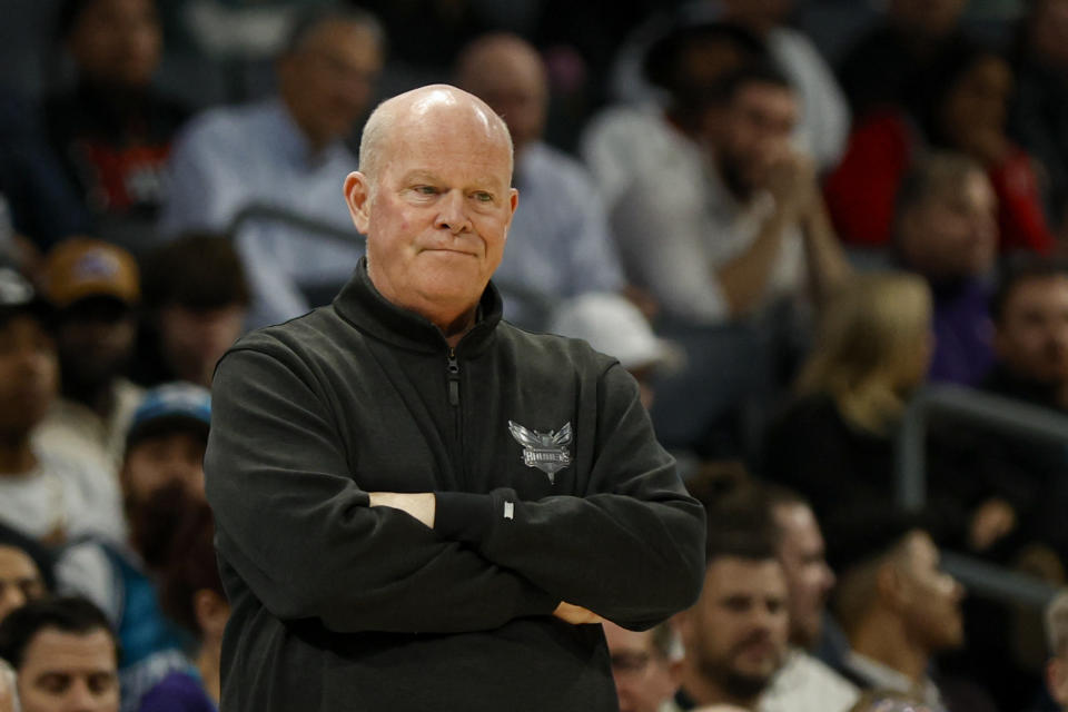 Charlotte Hornets head coach Steve Clifford watches as Charlotte plays against the Miami Heat during the first half of an NBA basketball game in Charlotte, N.C., Monday, Dec. 11, 2023. (AP Photo/Nell Redmond)