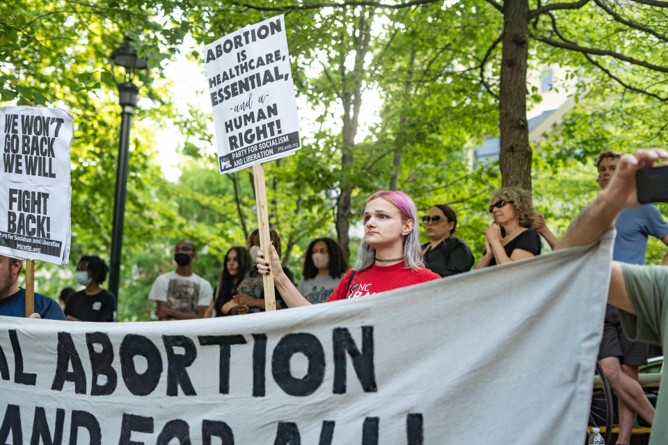 People gather in Pritchard Park to react to Supreme Court Justice's Alito leaked opinion draft regarding the possible turnover of Roe V. Wade on May 3, 2022.