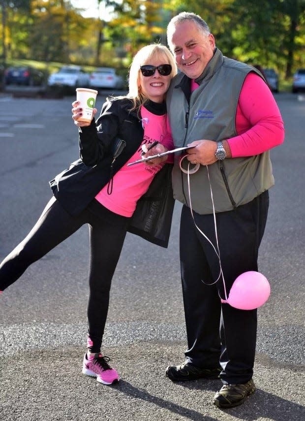 Diane and Dr. David Rasa at a walkathon for breast cancer awareness at the High Mountain Health office on Hamburg Turnpike.