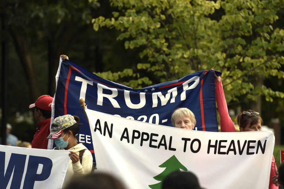 FILE - An Appeal To Heaven flag is pictured as people gather at Independence Mall to support President Donald Trump as he visits the National Constitution Center to participate in the ABC News town hall, Sept. 15, 2020, in Philadelphia. Supreme Court Justice Samuel Alito is embroiled in a second flag controversy, this time over the “Appeal to Heaven” flag, a banner that in recent years has come to symbolize Christian nationalism and the false claim that the 2020 presidential election was stolen. The flag was seen outside his New Jersey beach home last summer. (AP Photo/Michael Perez, File)