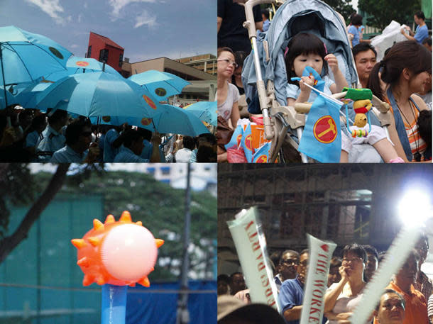 Pictures of various Workers' Party paraphernalia-- clockwise from top left: WP umbrellas, a toddler with WP flags, WP clappers and a fan's WP hammer. (Yahoo! photos / Aeron Chew)