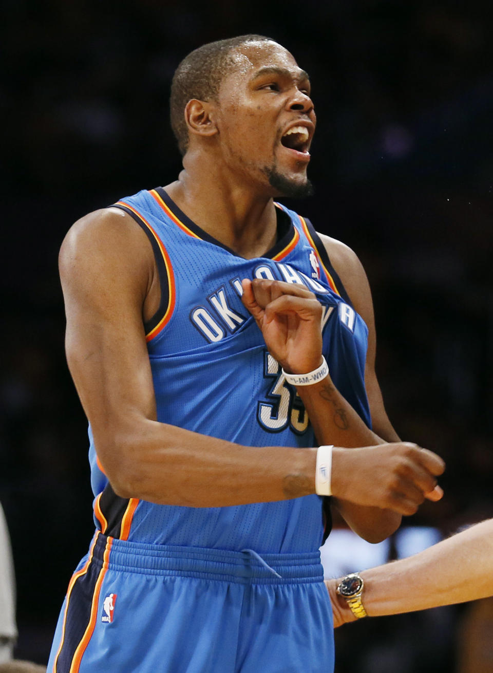 Oklahoma City Thunder small forward Kevin Durant reacts to being called for a foul against the Los Angeles Lakers during the first half of an NBA basketball game in Los Angeles, Sunday, March 9, 2014. (AP Photo/Danny Moloshok)