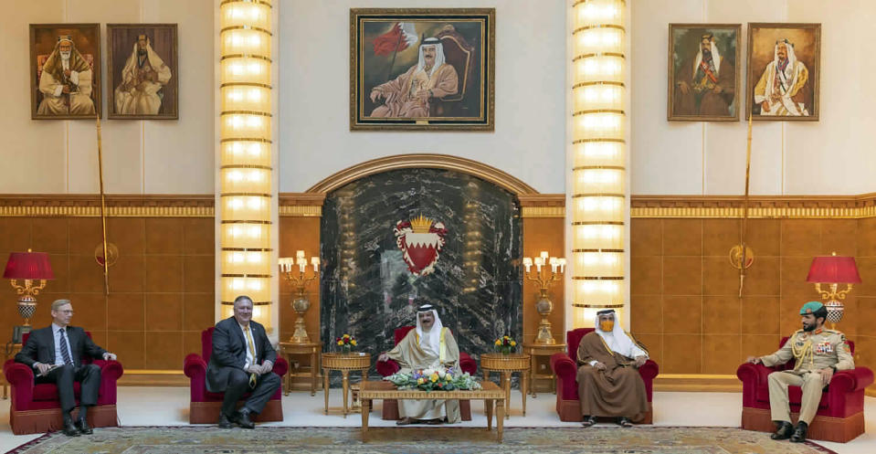 From left, U.S. special representative for Iran Brian Hook, U.S. Secretary of State Mike Pompeo, Bahraini King Hamad bin Isa Al Khalifa, Bahraini Crown Prince Salman bin Hamad Al Khalifa and Bahraini national security adviser Nasser bin Hamad Al Khalifa meet at Sakhir Palace in Manama, Bahrain, Wednesday, Aug. 26, 2020. Pompeo held closed-door meetings Wednesday with Bahrain's royal family and top officials in the United Arab Emirates amid the Trump administration's push for Arab nations to recognize Israel. (Bahrain News Agency via AP)