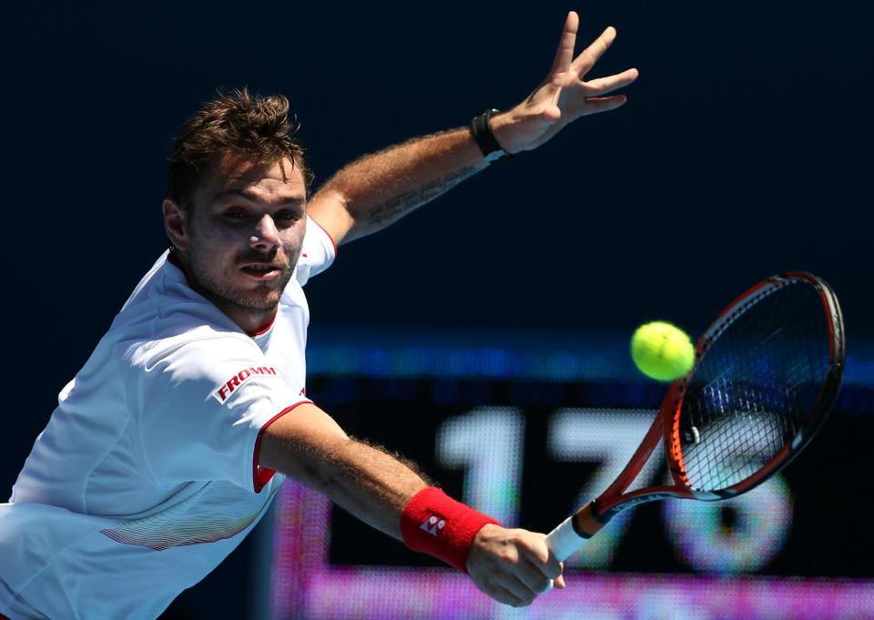 Stanislas Wawrinka durante su partido ante Andrey Golubev en la primera ronda del Abierto de Australia el lunes 13 de enero de 2014.(AP Foto/Rick Rycroft)