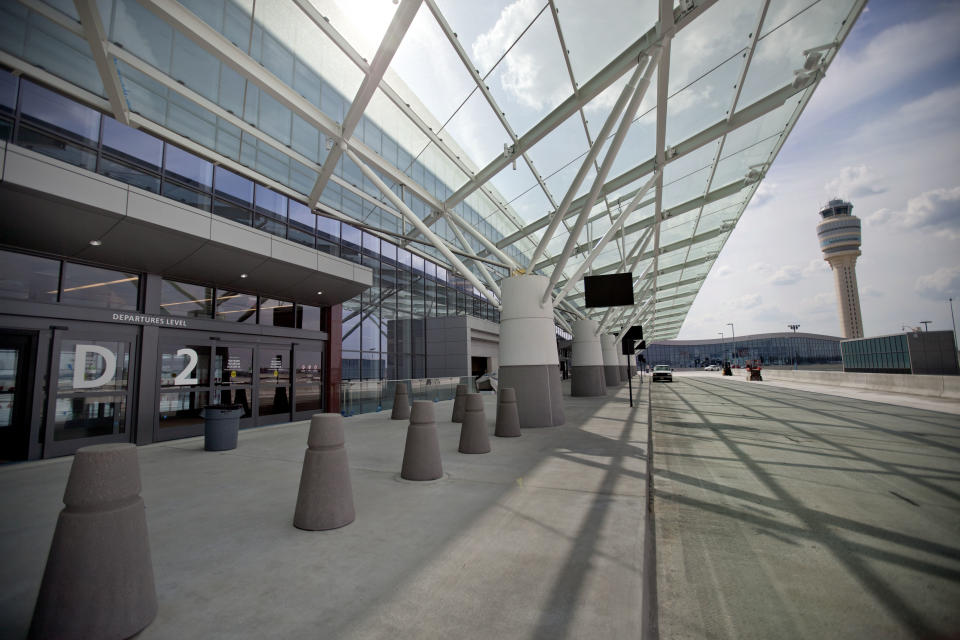 The new Maynard Holbrook Jackson Jr. International Terminal at Atlanta's airport is seen Wednesday, March 28, 2012. The new $1.4 billion international terminal at the world's busiest airport will be a sleek launching pad for millions of passengers that’s designed to help Atlanta grab a growing share of the lucrative market for global travelers. (AP Photo/David Goldman)