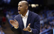 FILE - In this Jan. 2, 2019, file photo, Harvard head coach Tommy Amaker reacts during an NCAA college basketball game against North Carolina in Chapel Hill, N.C. When George Floyd died this spring under a policeman's knee, Amaker didn't send out a tweet affirming Black Lives Matter or add a uniform patch calling for Equality. He simply continued exposing his players to social justice issues, as he had been doing for more than a decade, establishing the program as a model for other teams only now showing an interest. (AP Photo/Gerry Broome, File)