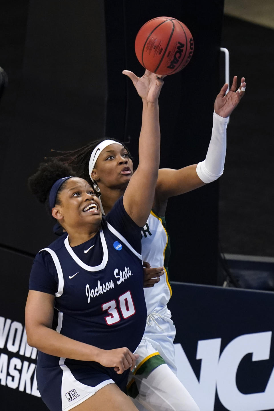 Jackson State center Diamond Forrest (30) fights for a rebound with Baylor forward NaLyssa Smith during the second half of a college basketball game in the first round of the women's NCAA tournament at the Alamodome, Sunday, March 21, 2021, in San Antonio. (AP Photo/Eric Gay)