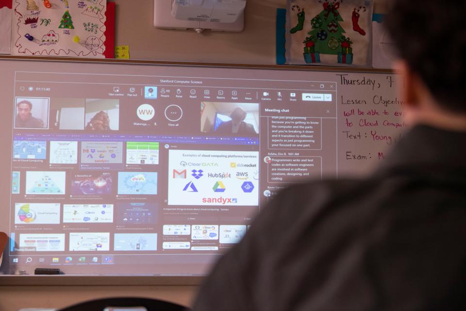 Students go over a final review of the lessons they’ve learned in Introduction to Computer Science, a dual enrollment class through Stanford University, at Antioch High School in Antioch, Tenn., Thursday, Dec. 7, 2023.