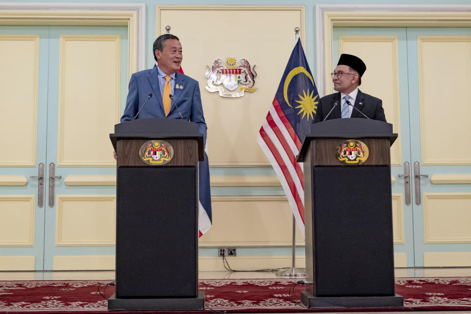 Thai Prime Minister, Srettha Thavisin, left, meets with Malaysia's Prime Minister Anwar Ibrahim on the occasion of Thavisin's official visit to Malaysia, in Jakarta, Wednesday, Oct. 11, 2023. (Afiq Hambali/Prime Minister’s Office of Malaysia via AP)