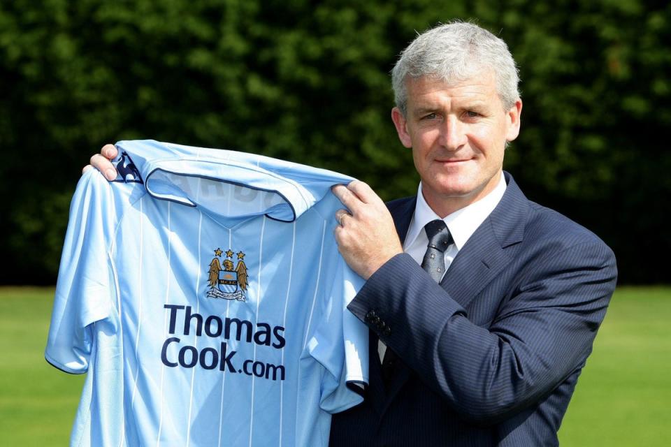 Mark Hughes was sacked and replaced by Roberto Mancini on this day in 2009 (Martin Rickett/PA) (PA Archive)