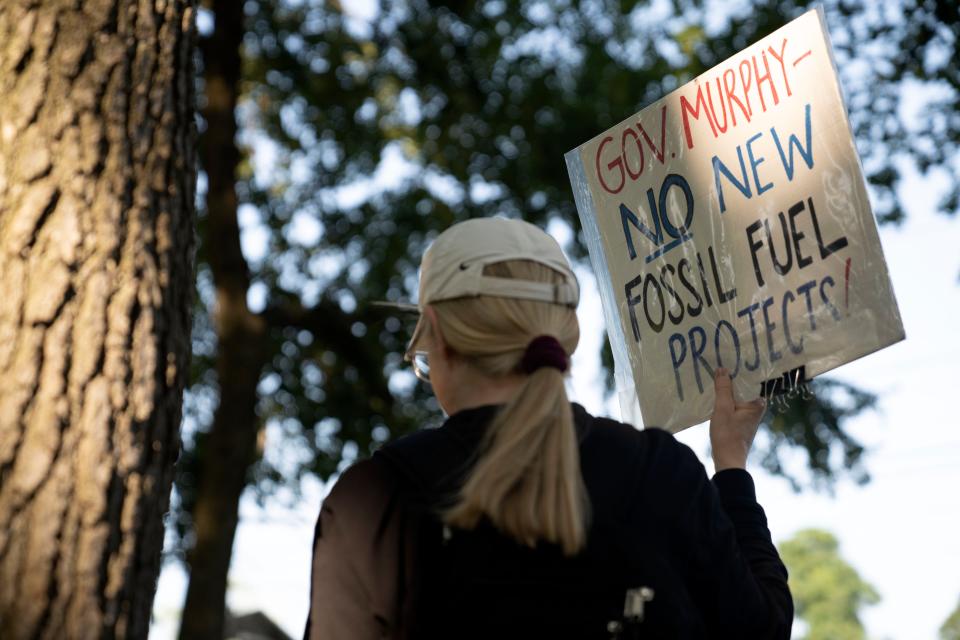 A rally calling for new legislation regulating trains carrying oil and other hazardous materials at Bookstaver Park in Teaneck on Thursday, July 6, 2023. 