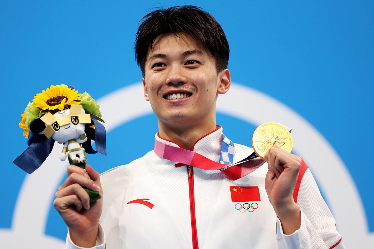 Shun Wang of Team China poses on the podium during the medal ceremony for the Men's 200m Individual Medley  during the Tokyo 2020 Olympic Games at Tokyo Aquatics Centre on July 30, 2021 in Tokyo, Japan.  (Maddie Meyer / Getty Images file)