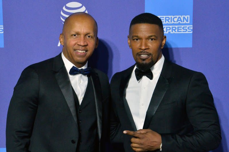 Jamie Foxx (R) and Bryan Stevenson attend the Palm Springs International Film Festival in 2020. File Photo by Jim Ruymen/UPI